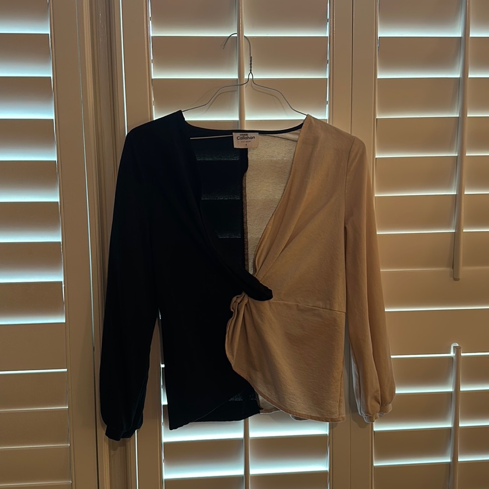 Two tone cream and black knit blouse